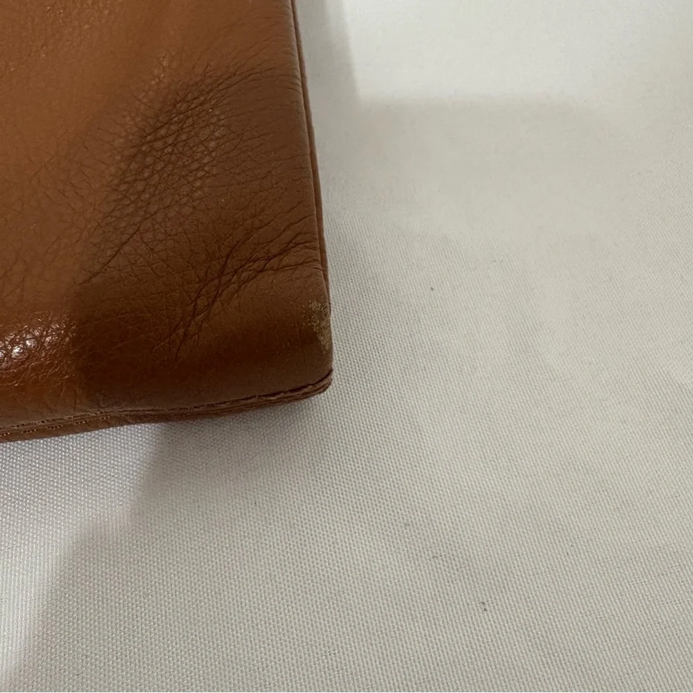 Michael Kors brown leather crossbody bag with gold-tone hardware